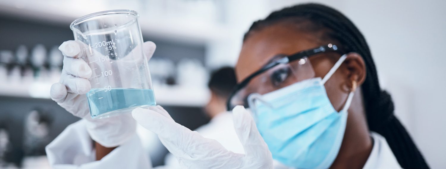 Laboratory technician verifying a sample